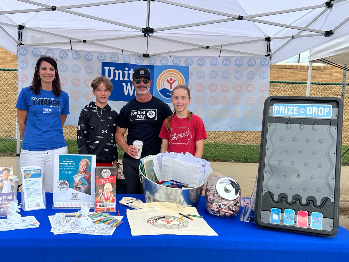 Tim Blotske with volunteers at the 2023 Sioux Falls Sidewalk Arts Festival